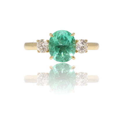 18 karat Emerald and Diamond trilogy ring