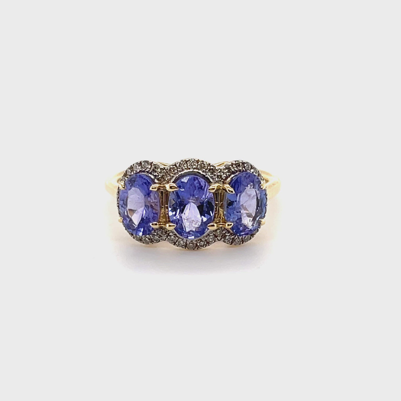 14CT Yellow Gold Tanzanite and Diamond Trilogy Ring