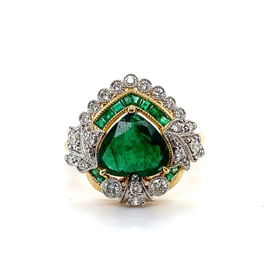 18CT yellow gold heart cut emerald and diamond ring