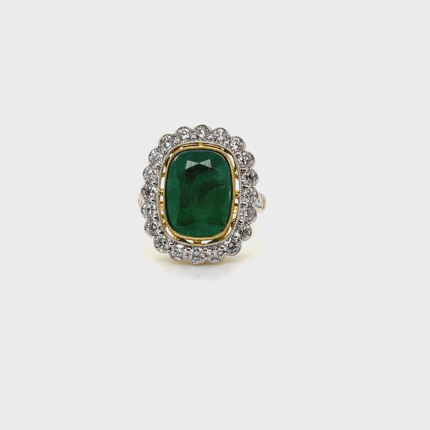 18ct yellow gold emerald and diamond halo ring