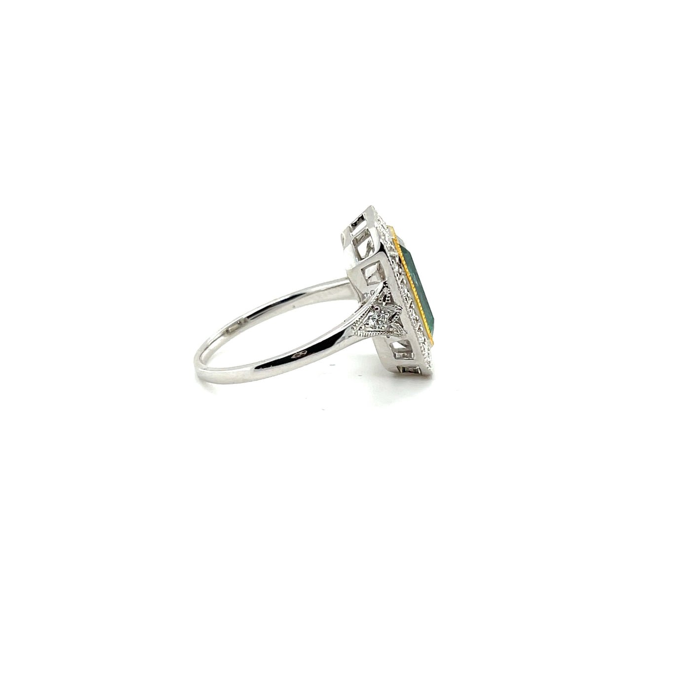 18ct white gold Colombian emerald and diamond dress ring